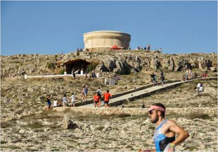 subir ao farol no Half Triathlon Menorca