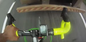 2 cyclists behind a truck at 124 km / hour