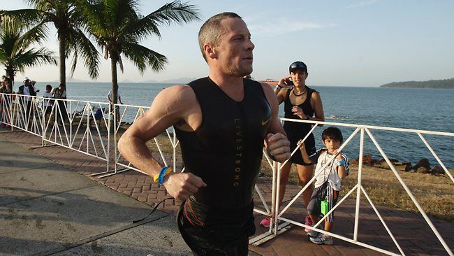 Lance Armstrong competing in Triathlon