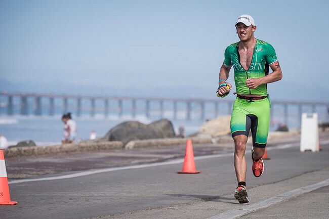 Lionel Sanders running in Ironman