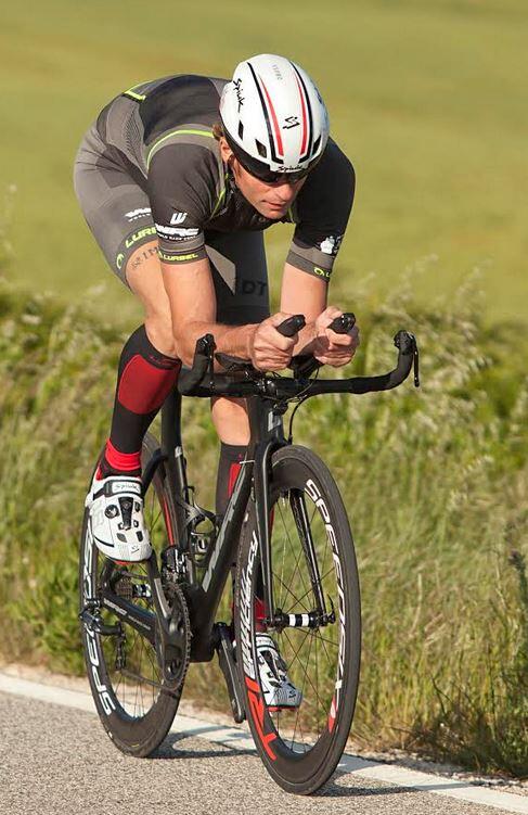 Riki Abad on the bicycle