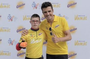 Javier Gómez Noya delivers a car to Borja Gómez a young man from 15 years with Down Syndrome