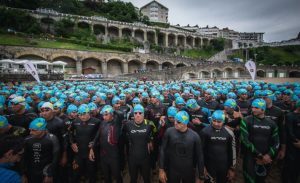 The Triathlon of Zarautz with a luxury sign