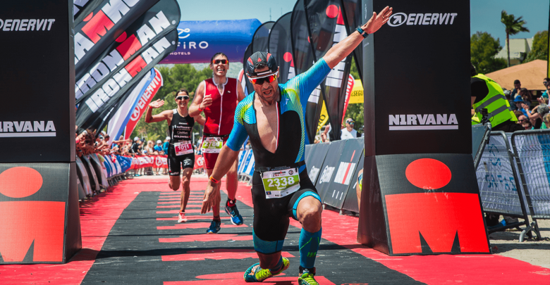 Trialteta reaching the finish line at the IRONMAN 70.3 Mallorca