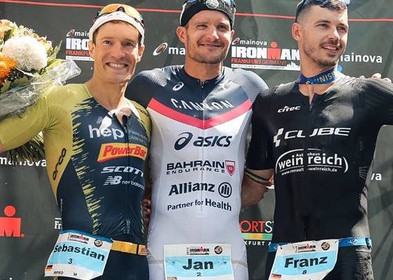 Jan Frodeno and Sebastian Kienle on the podium of IRONMAN Frankfurt