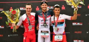Alistair, Frodeno and Noya at the podium of an IRONMAN