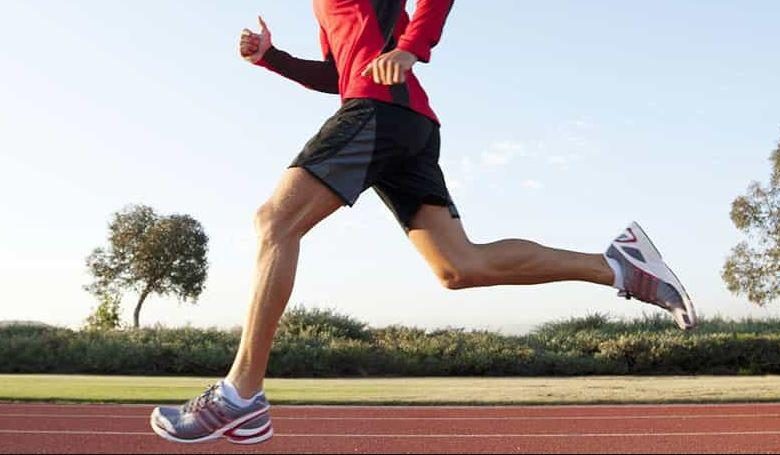 Runner training on track