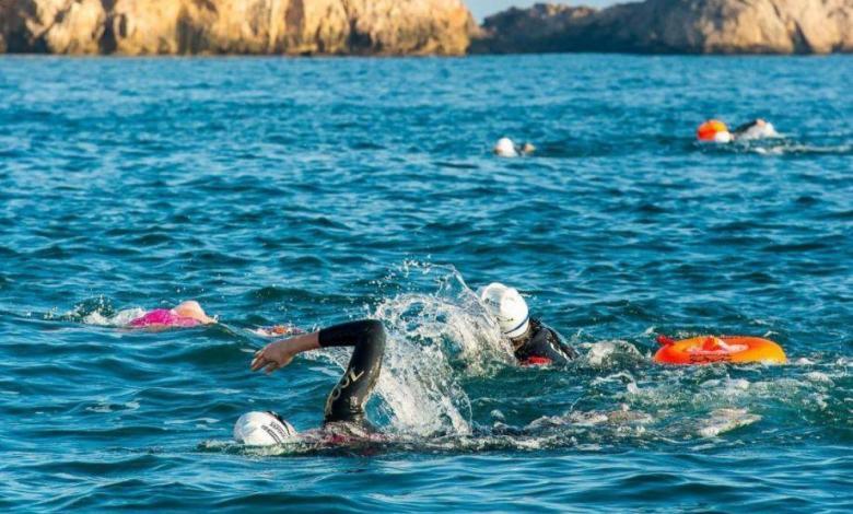 Neda el Món swimming crossing