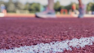 Athlete training on running track