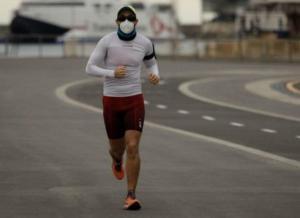 athlete training with mask