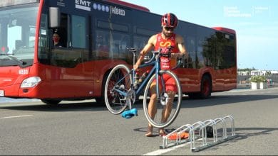 Roberto Sánchez Mantecón faces a bus