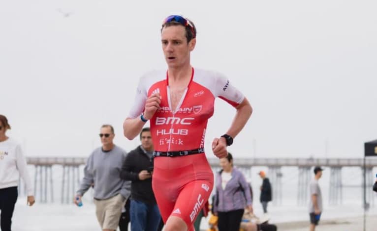 Alistair Brownlee wins the IROMMAN 70.3 Swansea