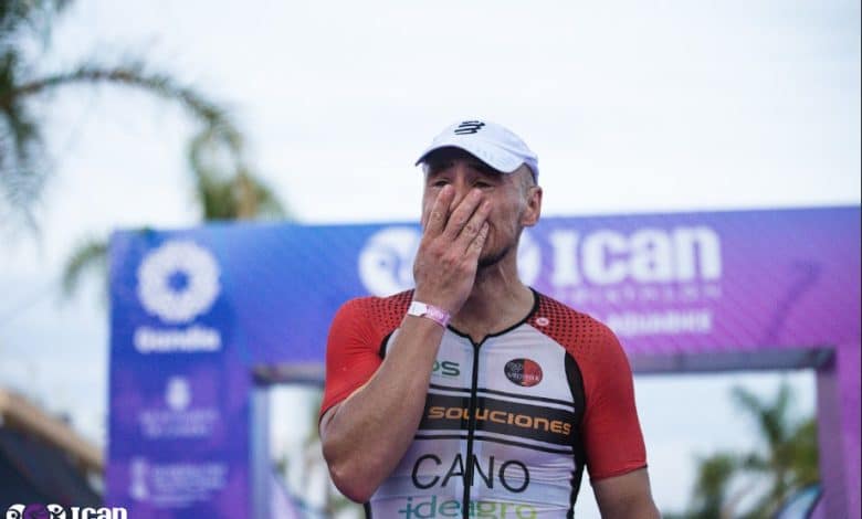 Image of a triathlete at the finish line of ICAN Gandia