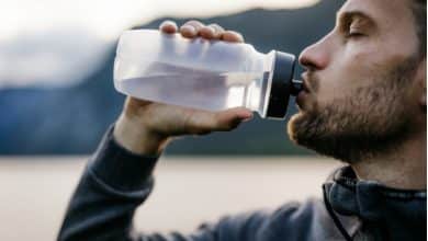 image of a sportsman drinking in winter