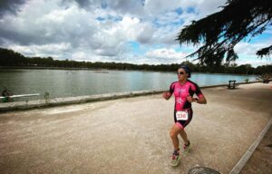 Instagram/ a triathlete running in the country house