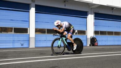Octavio Passos/Getty Images for IRONMAN) / a triathlete on the F1 circuit