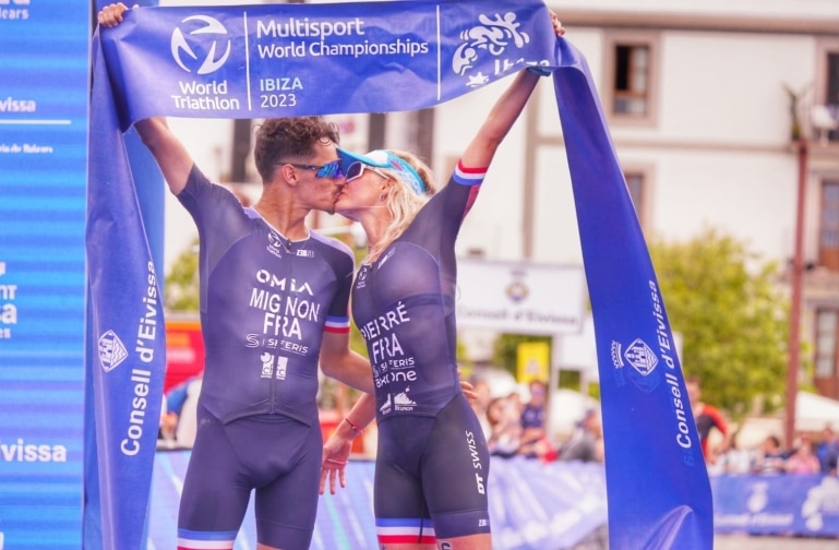 FETRI/ Marjolaine Pierre and Clement Mignon kissing at the finish line