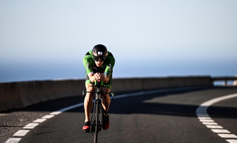 IRONMAN / a triathlete on the bike in the IRONMAN 70.3 Marbella