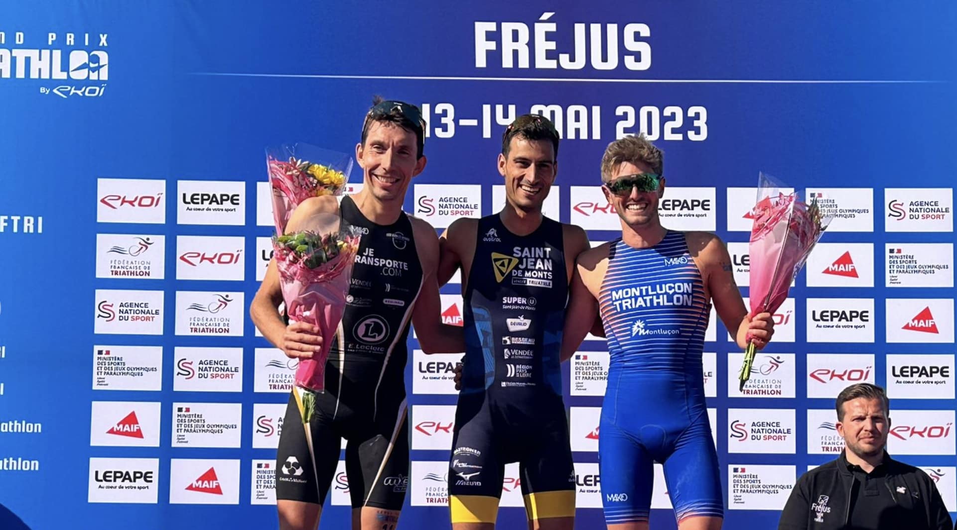 Juanan Fernaández/ Mario Mola y Genis Grau en el pódium del Grand Prix