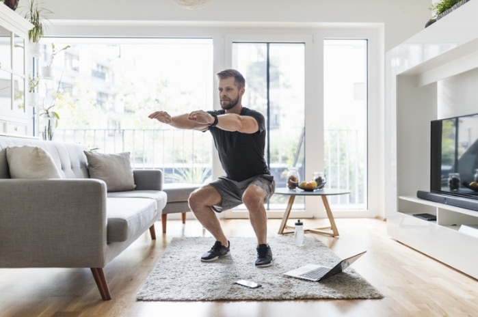 A sportsman doing squats