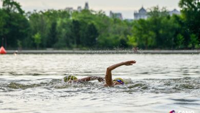 Canofotosport/ Triathletes swimming in the Casa de Campo