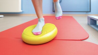 Canva/ inagen of an athlete doing proprioception with a Bosu