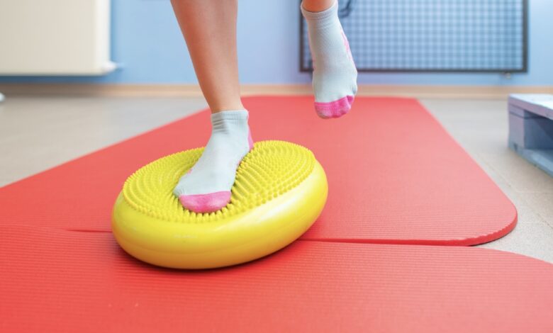 Canva/ inagen of an athlete doing proprioception with a Bosu