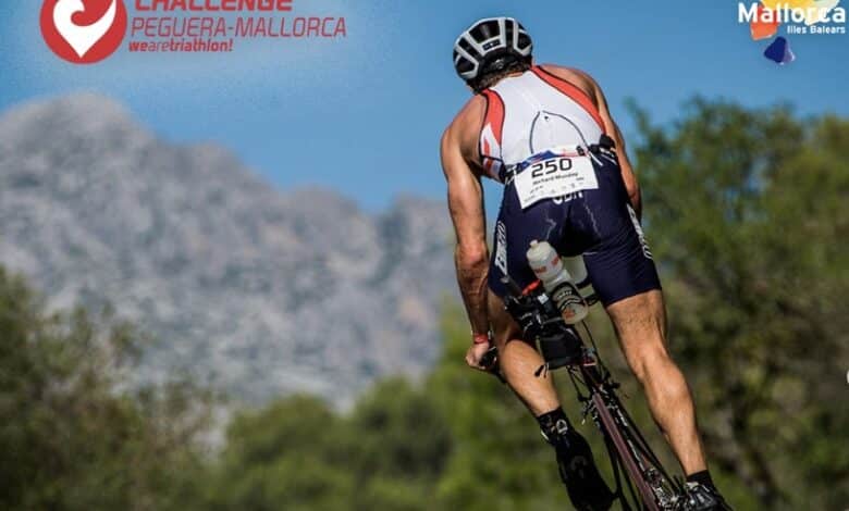 A triathlete in the Challenge Peguera cycling