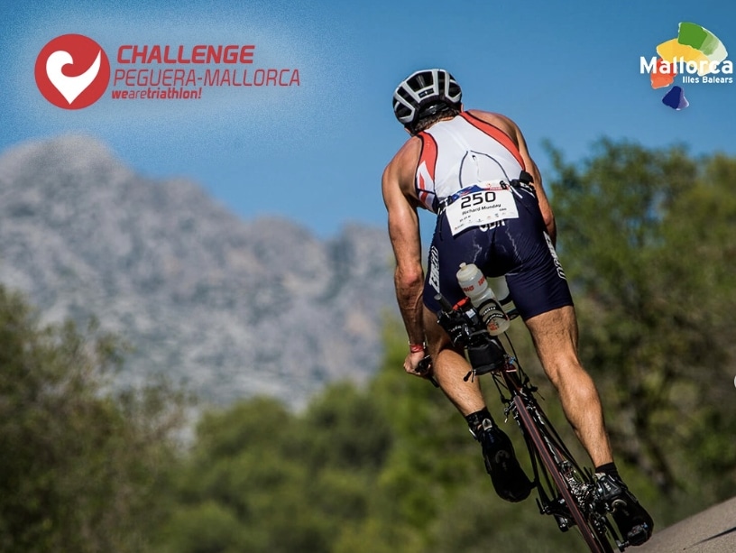 A triathlete in the Challenge Peguera cycling
