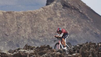 IM / A triathlete on the bike in the IRONMAN Lanzarote