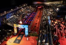 Siya Ndzimande/ Das Bild der Ziellinie des IRONMAN Barcelna
