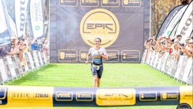 Image of a triathlete entering the finish line at the EPIC Triathlon
