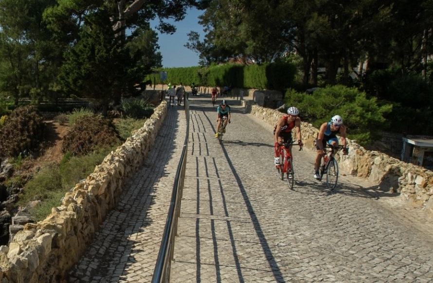 IRONMAN/ image of triathletes entering Cascais