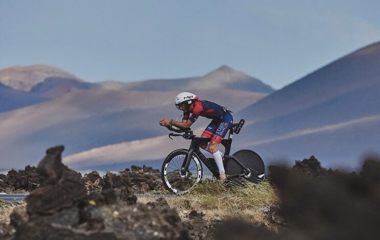 A triathlete cycling at the IRONMAN Lanzarote