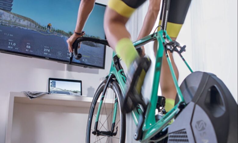 Image of a cyclist training on a roller with Bkool