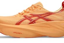 ASICS GEL-SLOWCUSH en color naranja con detalles rojos vista de perfil